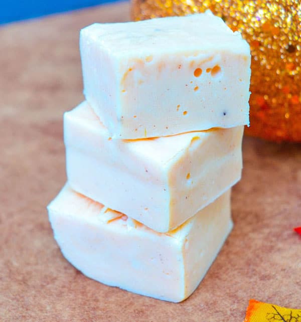 close up of stacked pieces of light colored fudge