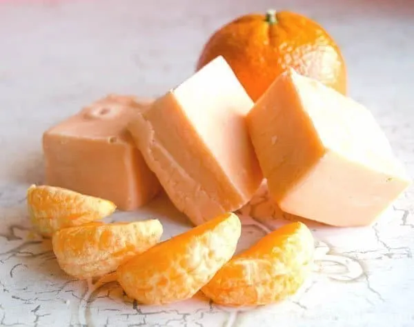 Easy Orange Microwave Fudge Recipe - Create this easy Orange Microwave Fudge in minutes. Just five simple ingredients to create an amazing melt in your mouth treat.