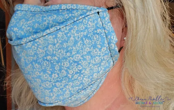 Fabric Face Mask Pattern & Sewing Tutorial - Need a fabric face mask tutorial that uses hair ties? This Face Mask Pattern made with a Fat Quarter. You will get 2 masks with nose wire and filter pocket.