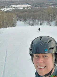 skier selfie at the top of the mountain at Granite Peak