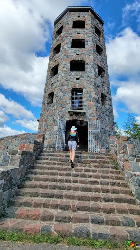 Woman entering Enger Tower in Duluth